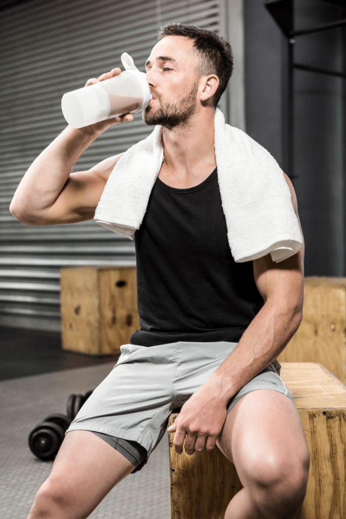 man drinking protein shake