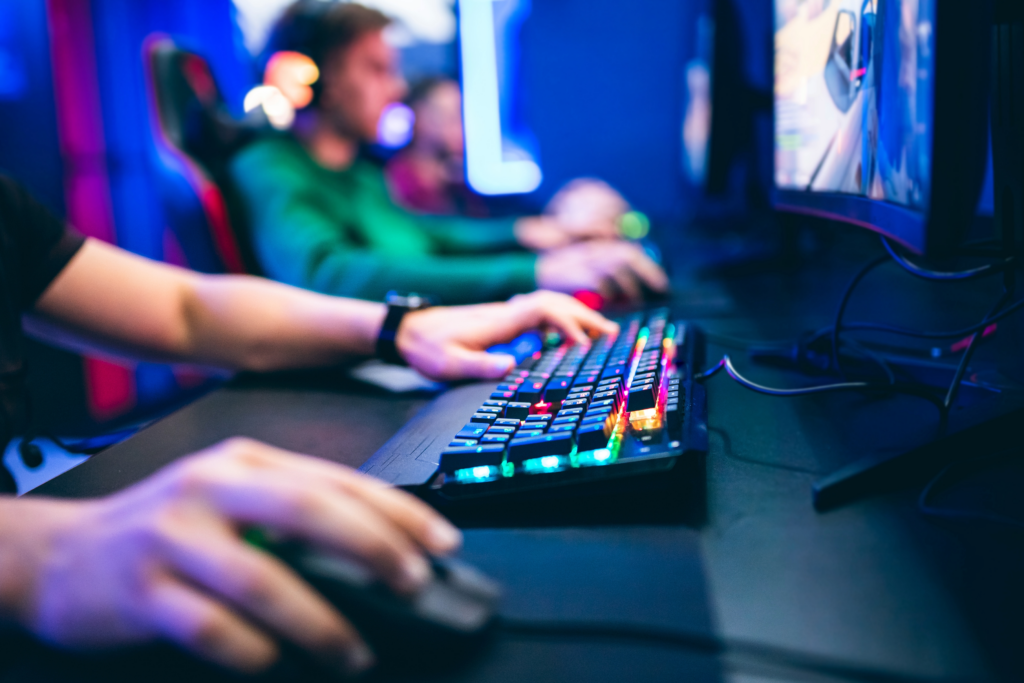 closeup of esports gamer on keyboard